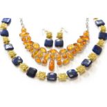 A lapis lazuli necklace and a pair of matching drop earrings, necklace length 49cm, earring drop