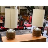 A pair of cork mounted table lamps