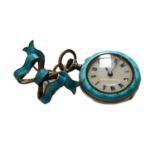 A lady's enamel fob watch, with a later enamel brooch, fob watch cased stamped 0.935