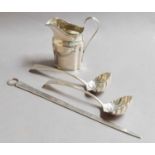 A pair of George III Silver Sauce-Ladles; a George III Silver Meat-Skewer and a George III Silver