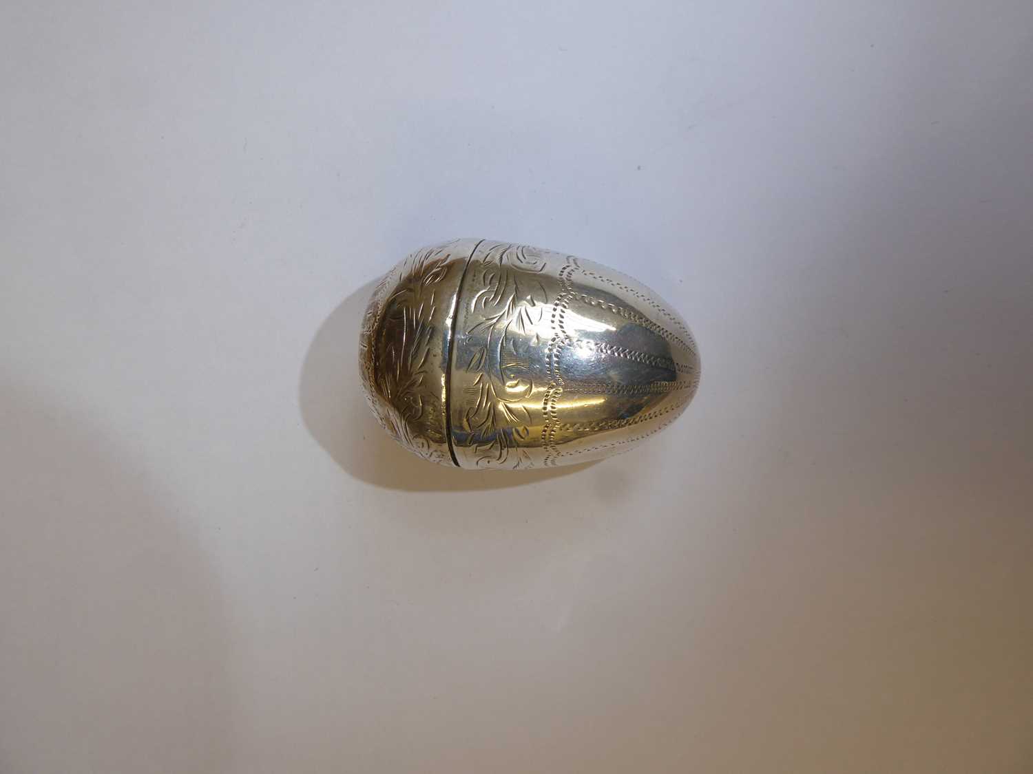 A George III Silver Nutmeg-Grater, Apparently Unmarked, Circa 1780 , ovoid and engraved with - Image 2 of 6