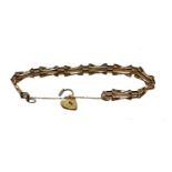 A pair of 9 carat gold cufflinks; a 9 carat gold gate link bracelet, length 18.2cm; a fob ring