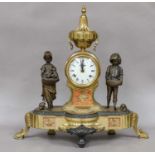 A modern gilt metal figural mantel clock, with urn shaped finial, striking on a bell, 45cm