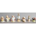 Seventeen Beatrix Potter figures, ten Beswick, three Royal Doulton and four Royal Albert (one tray)