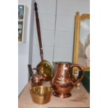 A 19th century copper jug, with riveted handle and split lower terminal, together with other brass