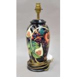 A modern Moorcroft tablelamp base, 'Queens Choice' designed by Emma Bossons, 29cmLamp base in good