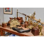 A large quantity of assorted Victorian and later copper and brass items, including: measuring