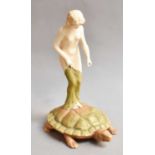 A Royal Dux figure of a semi nude maiden stood upon the shell of a turtle, 26cmFree from damage