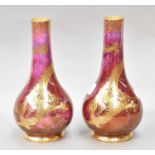 A pair of Wedgwood Dragon lustre vases designed by Daisey Makeig Jones (2)One with small shards