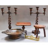 A pair of oak open twist three light candelabra, an apprentice made snap top table, milking stool,