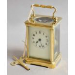 A brass striking carriage clock, circa 1900, twin barrel movement, platform lever escapement