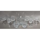 A comprehensive part suite of glassware, probably Continental, comprising 12 red wines, 12 white