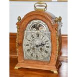 An 18th century style striking table clock, 20th century, silvered dial with Roman and Arabic