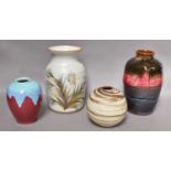 A collection of 20th century stone and earthenware studio vases, bowls, and charger, together with a