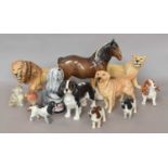 A Beswick shire horse, lion, lioness and Spaniel models etc, together with a Royal Doulton Dulux dog