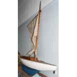 A large early 20th century pond yacht with sail and rigging, 120cm