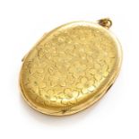 A 9 carat gold locket, with a floral engraved front, length 6.6cmGross weight 24.3 grams.