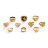 An 18 carat gold signet ring, finger size R; seven 9 carat gold rings (some a.f.); an unmarked