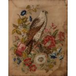 A 19th century wool and needlework of a bird of prey amongst flowers, 48cm by 84cm (unframed)