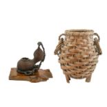 A Japanese Rootwood and Bamboo Double Gourd, 25cm wide, on a naturalistic wooden stand; and A
