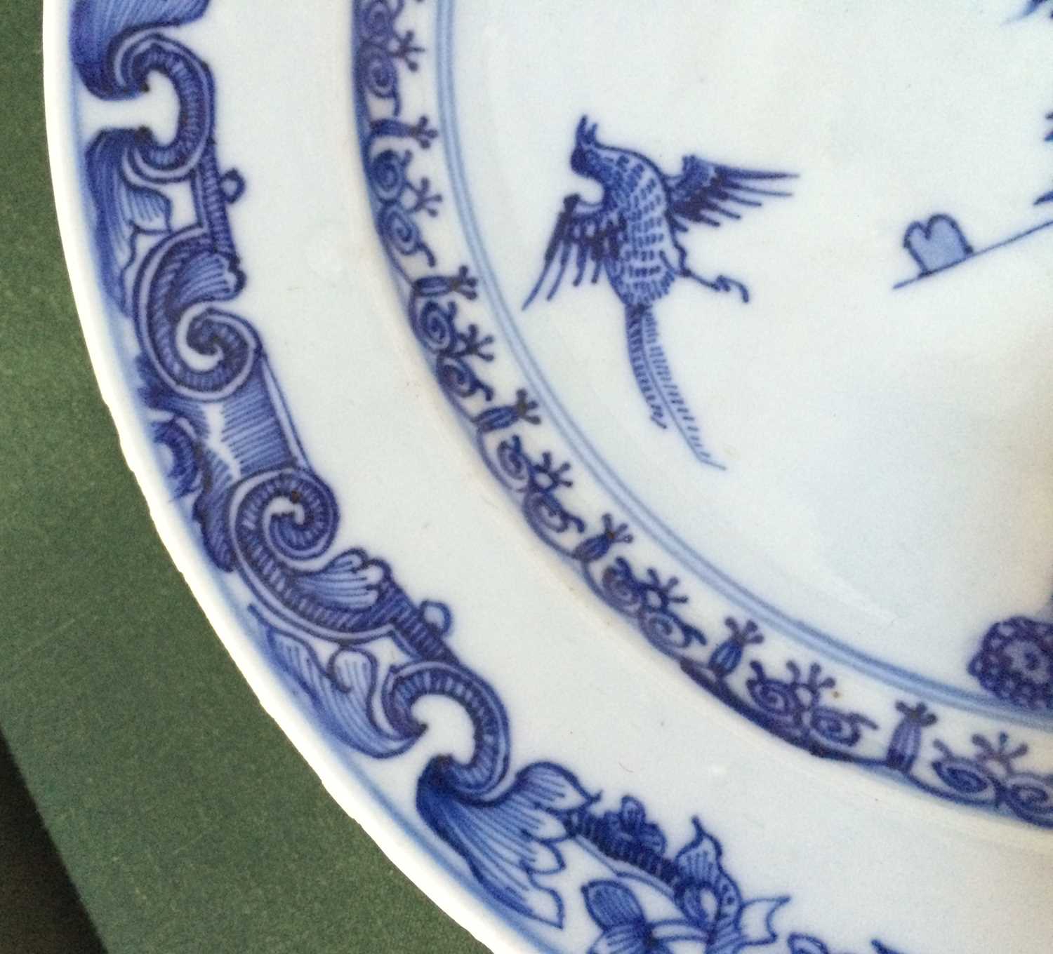 A Chinese Porcelain European Subject Plate, Qianlong, painted in underglaze blue with a palace in - Image 7 of 10