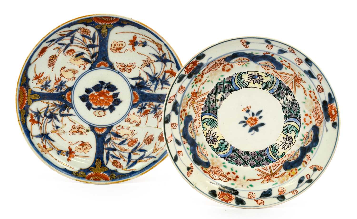 An Imari Porcelain Dish, Edo period, circa 1700, painted with stylised pine, flowers and fences, the