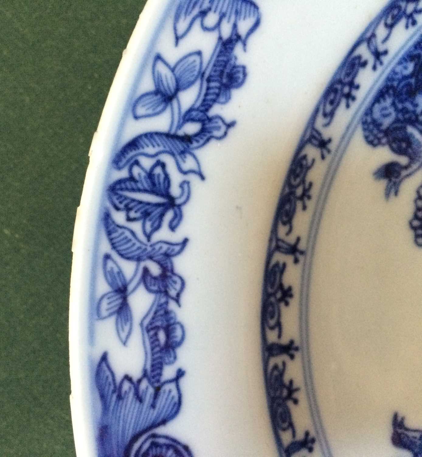 A Chinese Porcelain European Subject Plate, Qianlong, painted in underglaze blue with a palace in - Image 5 of 10