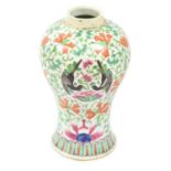 A Chinese Porcelain Baluster Vase, 19th century, painted in famille rose enamels with birds in a