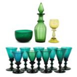 A Green Glass Decanter and Stopper, mid 19th century, of panelled baluster form with faceted