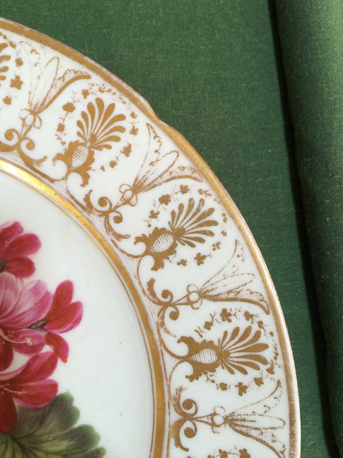 A Coalport Porcelain Plate, circa 1810, painted with a botanical specimen within a gilt anthemion - Image 2 of 8