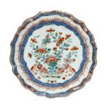 A Dutch-Decorated Chinese Porcelain Dish, Qianlong, of silver shape, painted in enamels and