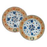 A Pair of Chinese Porcelain Verte Imari "Armorial" Plates, Kangxi, the well-painted Imari style with