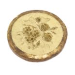 A Plaster Bread Mould, mid 19th century, of circular form, the centre as roses and a bunch of