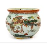 A Chinese Provincial Porcelain Jar, probably 17th century, painted in enamels with mythical beasts