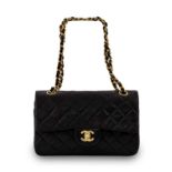 A Circa 1990s Chanel Quilted Double Flap Leather Shoulder Bag with gilt tone hardware, gilt chain