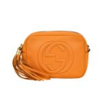 Gucci Small Orange Pebbled Leather Soho Disco Bag with embossed interlocking G's to the front, brass