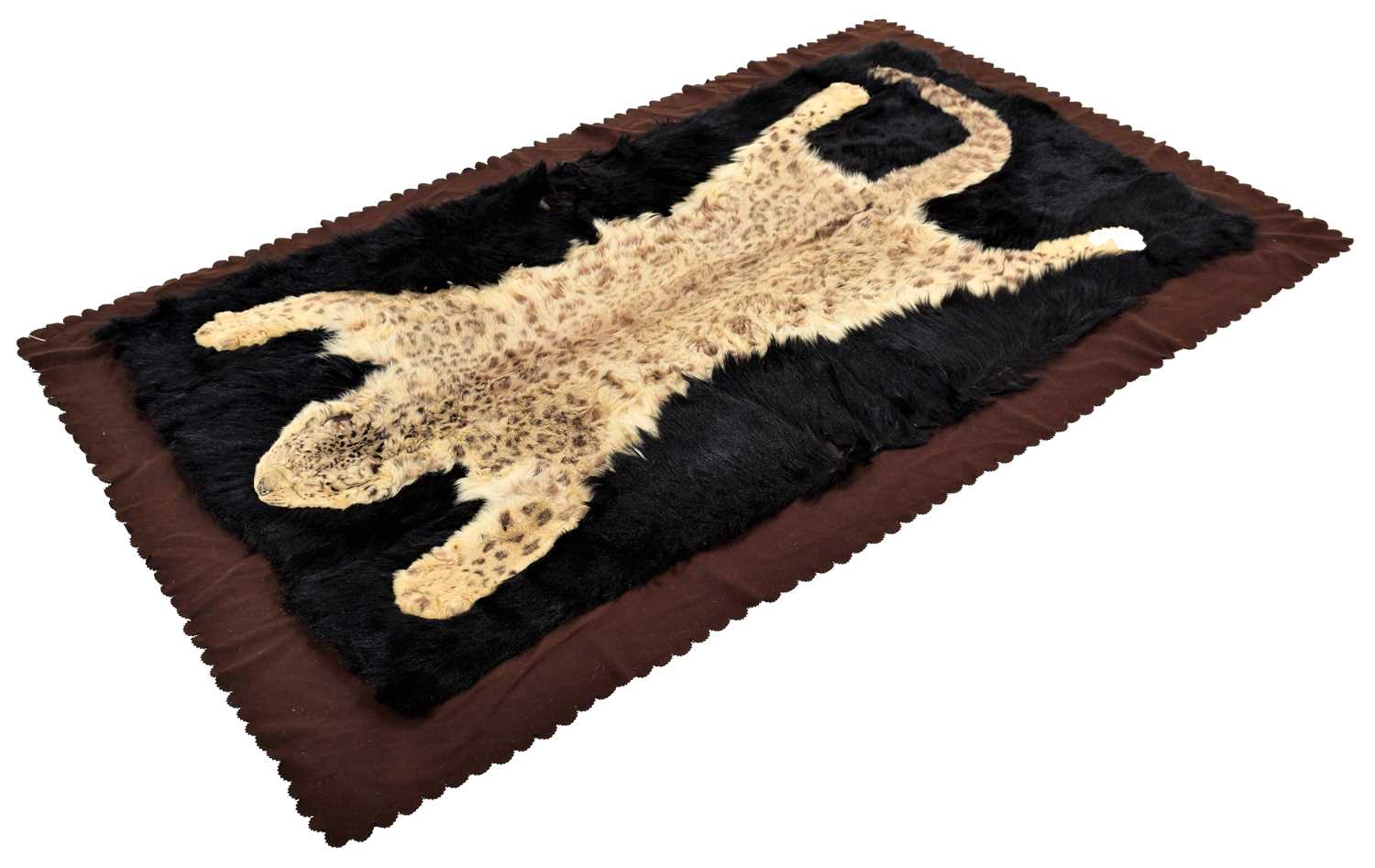 Taxidermy: A Rare Snow Leopard Skin Rug / Carriage Blanket (Panthera uncia), circa 1920-1930, by