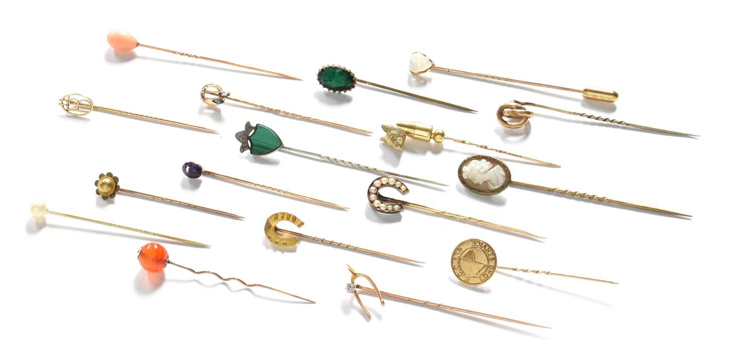Seventeen Stickpins, including a diamond example, an amethyst example, split pearl examples, an opal