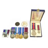 An Elizabeth II Long Service Group of Four Medals, awarded to 23397959 DVR. G.W. STOREY RASC.,