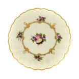 A Worcester Porcelain Fruit Saucer, circa 1770, painted by the Spotted Fruit painter with a