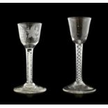 A Wine Glass, circa 1750, the rounded funnel bowl on an opaque twist stem and circular foot15.5cm