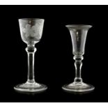 A Wine Glass, circa 1750, the rounded funnel bowl engraved with fruiting vine, on basal knop,