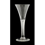 A Wine Glass, circa 1750, the bell shape bowl on an opaque twist stem and circular foot17cm highA
