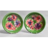 A Pair of Walter Moorcoft Pottery Plates, Anemone pattern on green grounds, each 21.5cm (2)