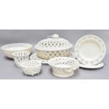 A Group of Decorative Modern Creamware, including pierced tureens and covers, plates, baskets etc.