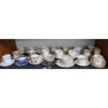 A Collection of 19th Century and Later Moustache Cups and Saucers, includes Staffordshire examples