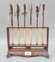 A Miniature Chinese Weapons Rack, housing a set of twelve miniature long handled bladed weapons