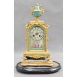 A Painted French Porcelain and Gilt Metal Striking Mantle Clock, circa 1890, with twin-barrel