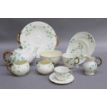 A Collection of Belleek Tea Wares, with green and black backstamps (two trays)All in generally