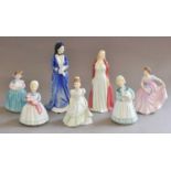 Seven Royal Doulton figures, 'Collinette' HN1999, 'Stayed at Home' HN2207, 'The Rag Doll' HN2142, '